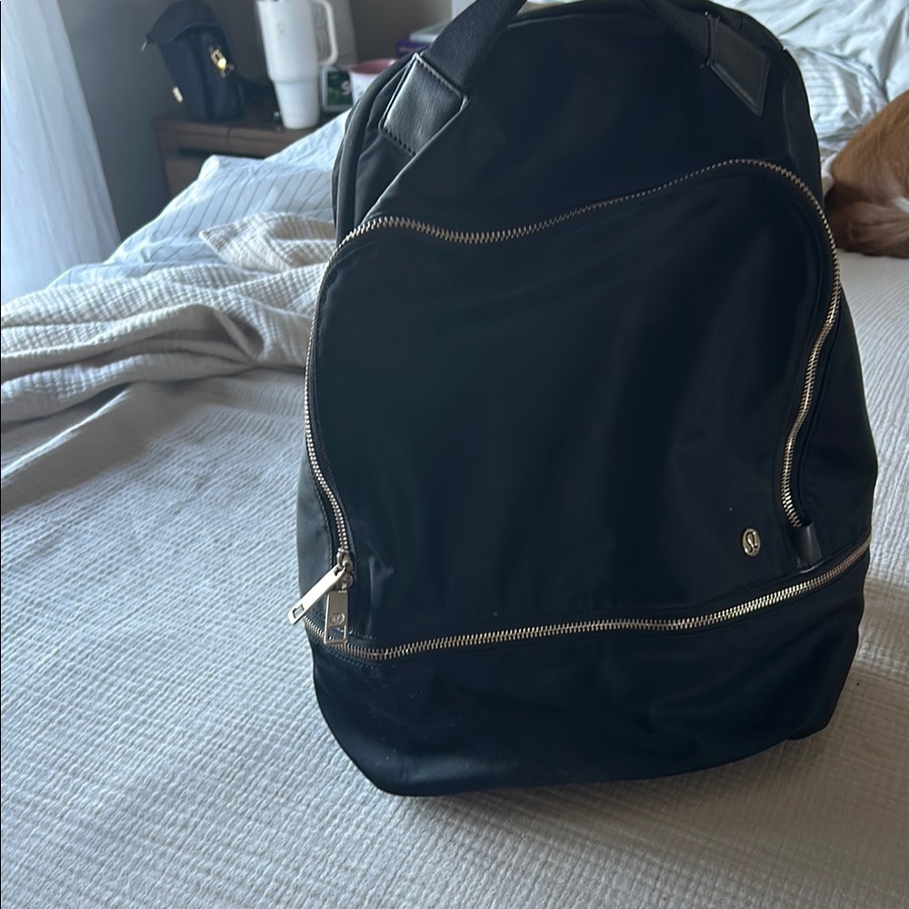 Classic Black Backpack with Durable Fabric and Medium Size